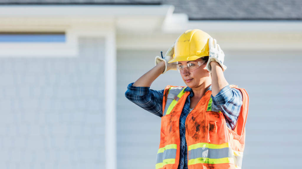 worker with hardhat and eye protection